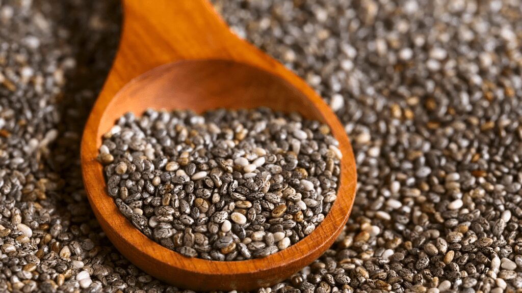 A close-up view of tiny black seeds from the Salvia hispanica plant.