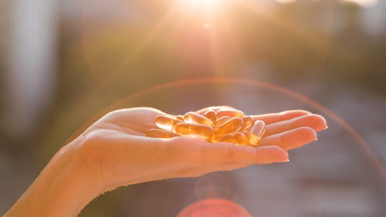 Capsules held in the sunlight.